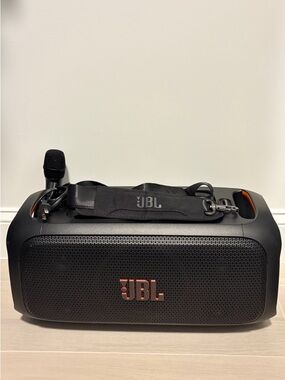 JBL Black Portable Party Speaker with Orange Accents and Strap